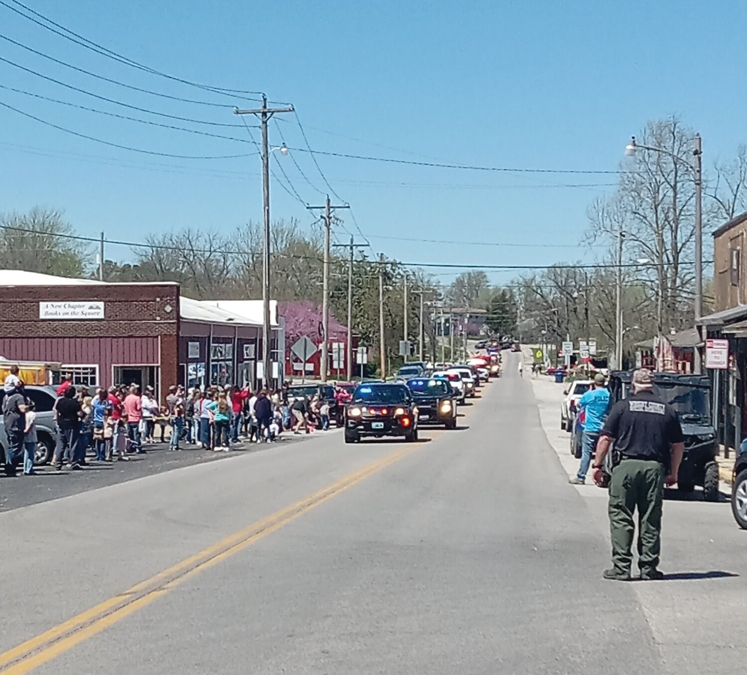 A First Responder Parade makes its way toward the square in Mansfield. The parade was held as a part of this year’s “Bark in the Park” fundraiser.